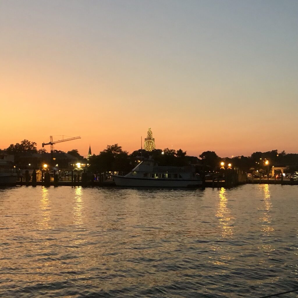 Lit up buildings at dusk in Annapolis Harbor